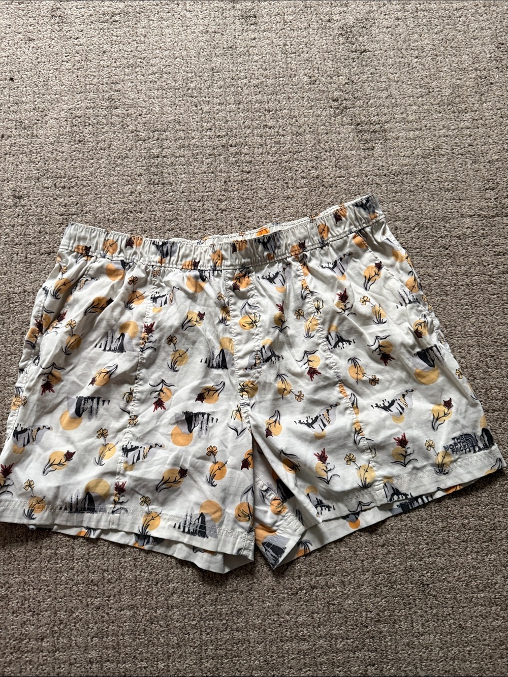 The North Face Printed Hiking Shorts — Yellow & Black Floral Motif